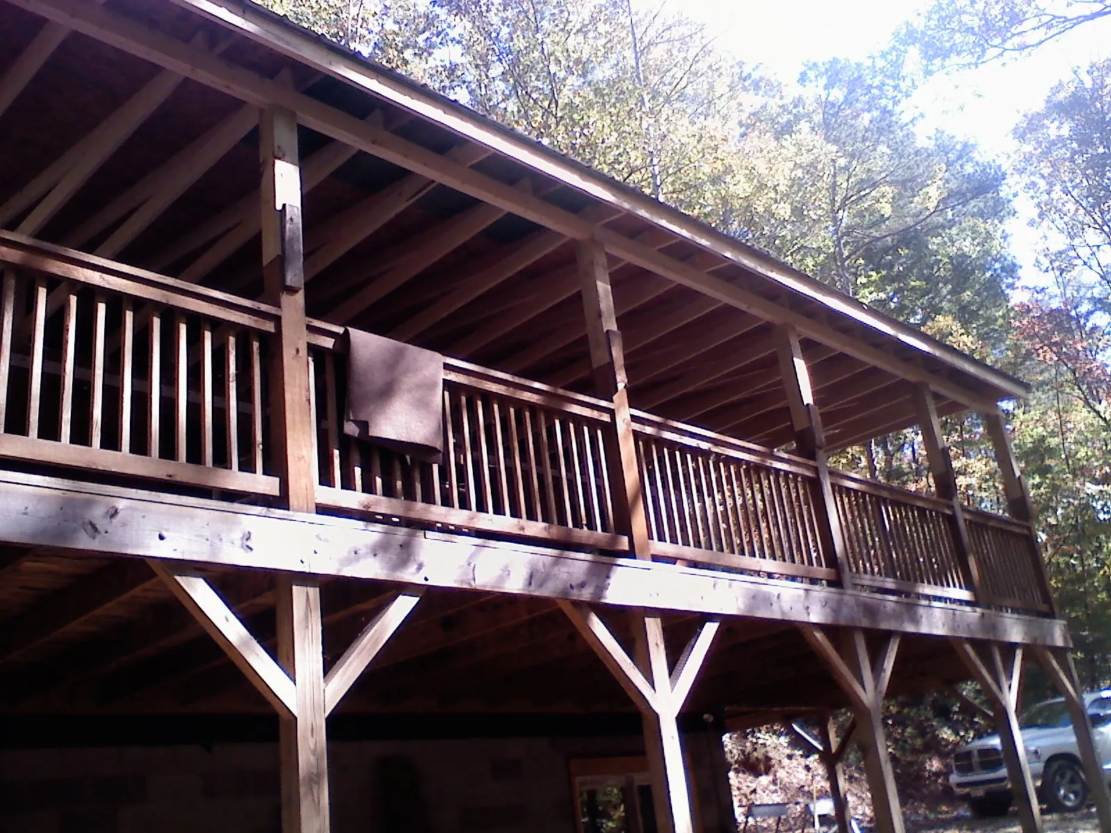 Timber framing under a new elevated porch and deck — Roof Leak Repair in Magnolia by Roofing Brothers